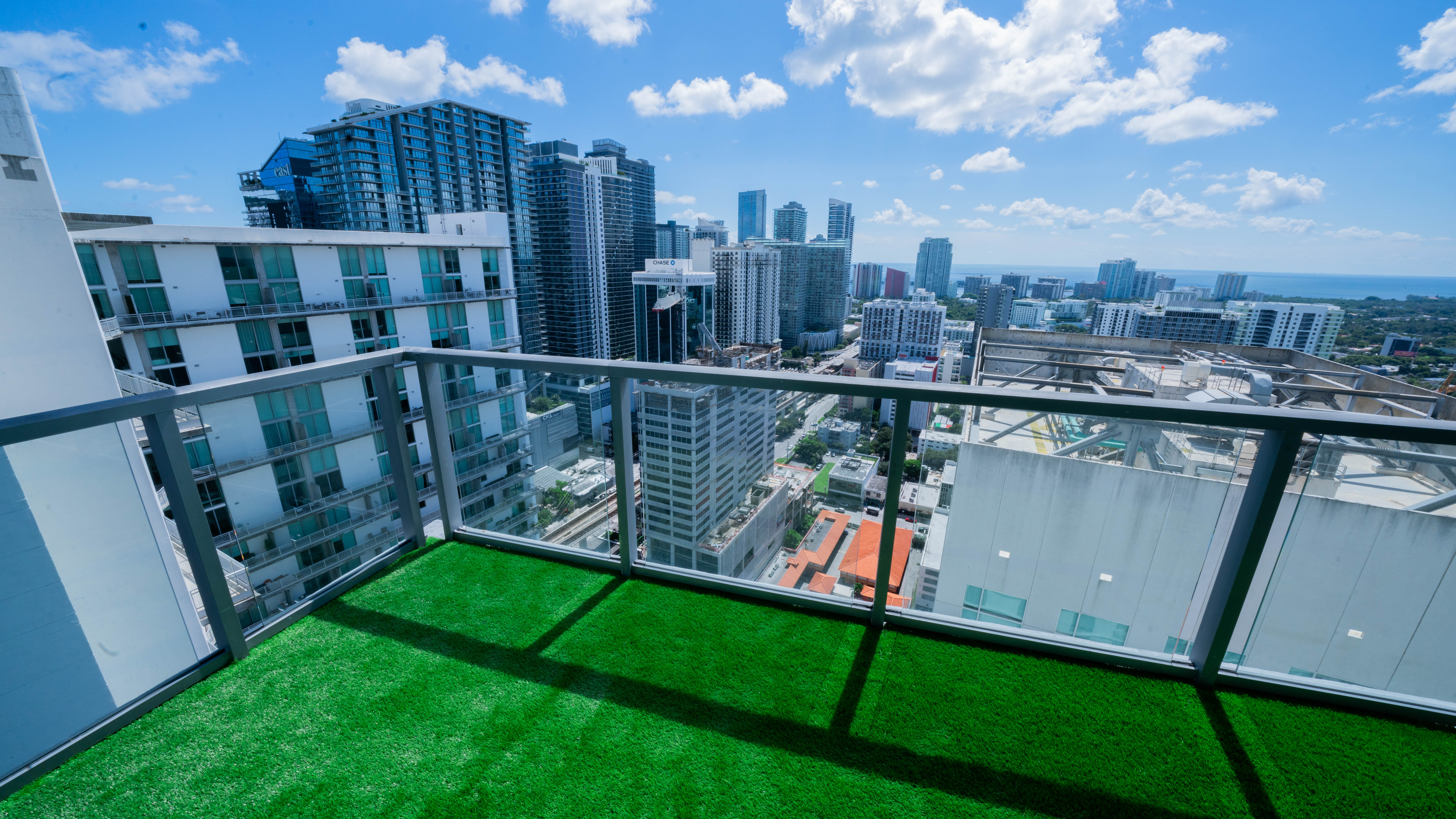 Project 2: the balcony transformed with fitted green artificial turf