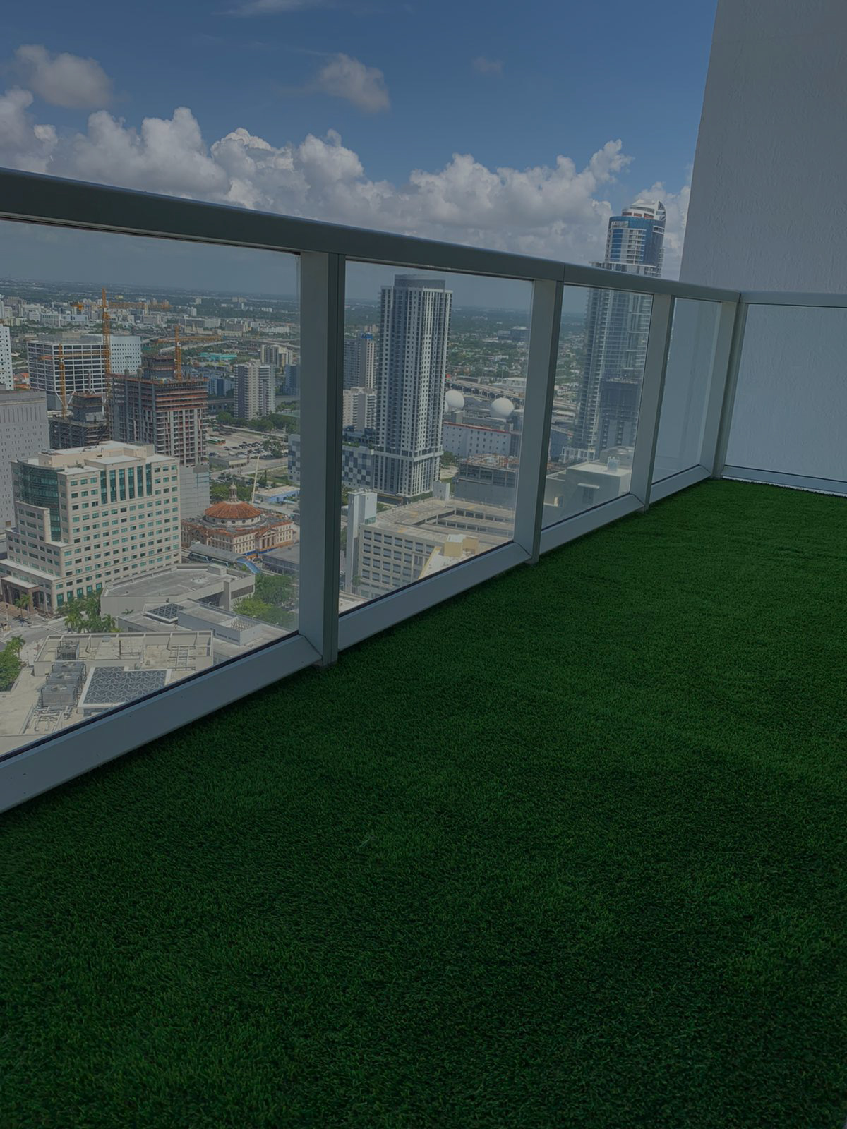 Completed balcony with green artificial turf